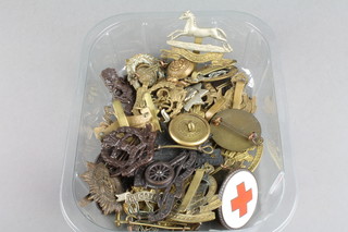 A quantity of WWII and later Army cap badges