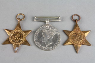 A World War Two trio - 1939-45 Star, Atlantic Star and British War medal