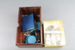 A 1983 uncirculated coin collection and minor cased crowns and coins