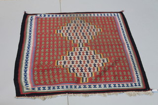 A tan ground Kelim rug 58 1/2" x 44 1/2" 