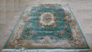 A green ground Chinese carpet 145 1/2" x 108" 