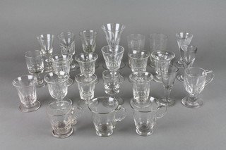 A collection of 24 mainly 19th Century English cordial and tott glasses