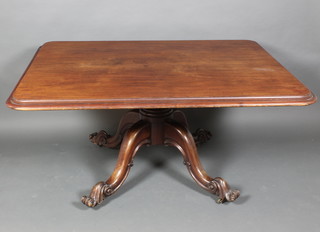 A Victorian rectangular mahogany breakfast table raised on a turned column and tripod base 30"h x 60"w x 46"d 