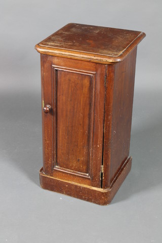 A Victorian mahogany pot cupboard wash stand with hinged lid revealing a ceramic bowl and cupboard enclosed by a panelled door 30"h x 16"w x 15"d