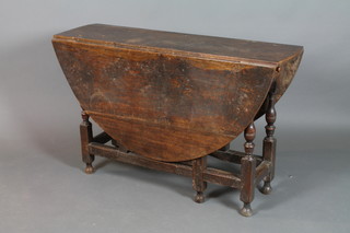 A 17th/18th Century oval drop flap gateleg dining table, fitted a  frieze drawer, raised on turned and block supports (1 drawer missing) 28"h x 44"w, x 54"d 