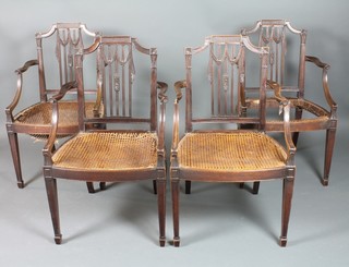 A set of 4 Adam style mahogany open arm chairs with woven cane seats (1f and re-caning required), raised on square tapering supports, spade feet, 