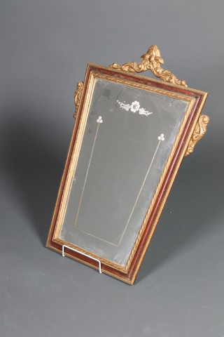 A French key stone shaped etched mirror contained in a decorative gilt painted frame 25"h x 17"w