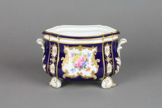 A Royal Crown Derby squat baluster vase, the blue and gilt ground decorated with panels of Spring flowers 6"