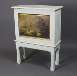 A Victorian aesthetic movement rectangular turquoise painted cabinet on stand, the interior fitted pigeon holes enclosed by a panelled door painted a lake scene with swans, raised on square tapering supports 34"h x 26w x 11"d 