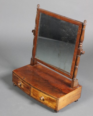 A Georgian mahogany square plate toilet mirror, the bow front base fitted 2 drawers, raised on bun feet 22 1/2"h x 18"w x 10"d
