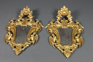 A pair of 19th Century Rococo style carved gilt wood framed mirrors 30"h x 19 1/2"w 