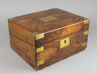 A Victorian figured walnut and brass bound writing slope fitted an inkwell with hinged lid 6" x 11 1/2" x 9 1/2"