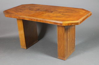 An Art Deco diamond shaped figured walnut  dining table, raised on standard end supports 30"h x 59"w x 31 1/2"d 