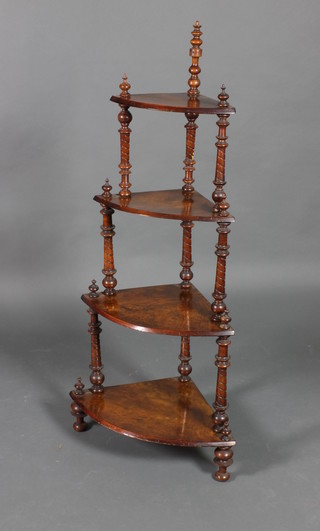 A Victorian walnut graduated 4 tier corner what-not on turned supports 51"h x 23"w at widest point by 16"d 