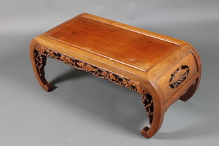 A Chinese carved pierced Padouk rectangular table, raised on scroll legs 16"h x 35"w x 18"d 