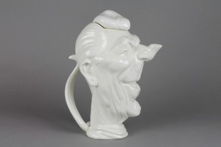A Luck and Flaw white glazed novelty teapot in the shape of Ronald Reagan dated 1981 11"