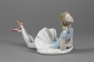 A Lladro figure of a reclining ballet dancer 9"
