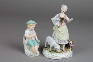 A German porcelain figure of a seated boy 4", a ditto group of a shepherdess f.