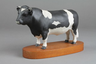 A Beswick figure of a Bull - Champion Coddington Hill Bar on a wooden plinth 8 1/2" 