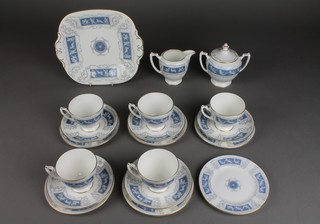 A Coalport Revelry tea set comprising 5 tea cups, milk jug, sugar bowl and cover, 5 saucers, 6 side plates and a sandwich plate