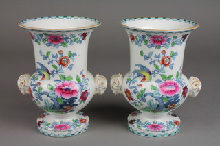 A pair of Wealden Ware Oriental pattern 2 handled vases decorated with flowers and rams head handles 