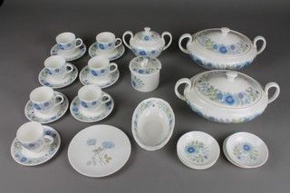 A Wedgwood Clementine service comprising 7 coffee cups, 7 saucers, 2 dishes, a bowl and cover, 2 tureens and covers, a preserve pot and lid and 4 dishes