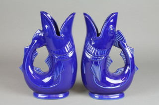 A pair of blue glazed gurgling fish jugs 10"