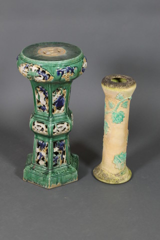 A Chinese green glazed jardiniere stand of hexagonal form, the pierced decoration with stylised flowers 28" (f), an Earthenware ditto