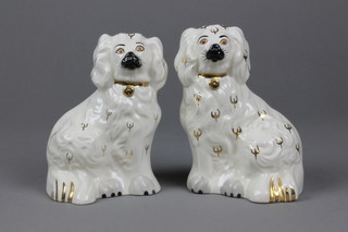 A pair of Royal Doulton figures of Staffordshire Spaniels 1378/6, 6"