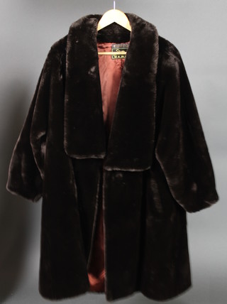A lady's full length simulated brown fur coat by Compagnie Ng Paris 