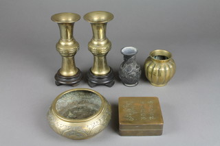 A square Chinese brass box decorated characters 4" x 4", a circular antimony brass bowl 4", a pair of club shaped vases 7", a melon shaped Chinese vase 4" and a metal vase 4"