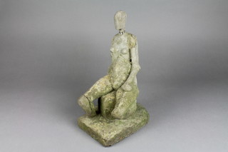A concrete seated figure of a naked lady 14" 