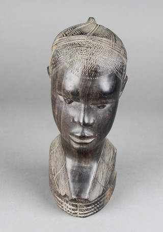 A carved wooden African portrait bust of a lady 9" 