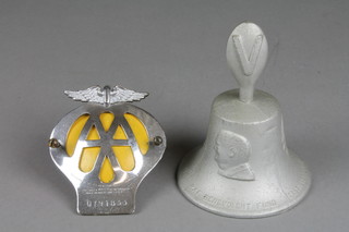 A RAF benevolent fund cast aluminium bell cast from shot down German aircraft, together with AA beehive radiator badge