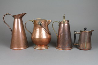 A Dresser style copper hotwater jug, a cylindrical tapered copper insulated jug, a baluster copper jug and cover 9" and a copper jug 