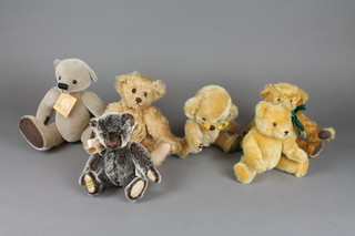 A Linda Edwards Little Treasure bear with articulated limbs 9", a Merrythought brown bear 8", a Merrythought yellow bear 8 1/2", a Woodland bear 10" and a yellow Hermann bear 7" 