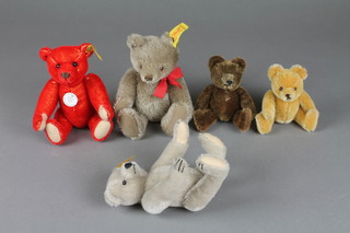 A red steiff teddybear 7", a brown ditto 7", a grey ditto 6", a brown and a light brown ditto 5"