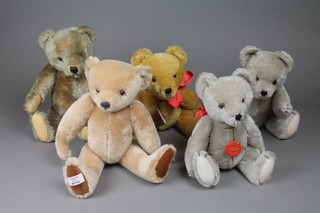 A yellow Hermann teddybear with articulated limbs 12", 2 grey Hermann bears 13" and 11", a light brown Merrythought bear with articulated limb 13", a Merrythought Asquits Bear 14" and a yellow bear with articulated limbs and squeaker 15"