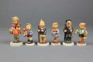6 Hummel figures - Chimney Sweep 122/0 4", Trumpet Boy 239/0 3", Little Hiker 162/0 3", Girl with Flowers 239/A, Christmas Gift 2074/A and School Girl 812/0