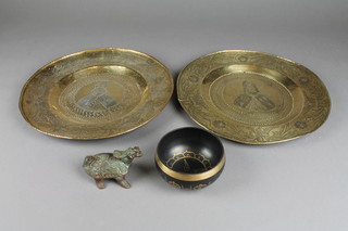 A Chinese bronze figure of a mythical beast 3 1/2", 2 chargers decorated figures 13" and a metal bowl 4" 