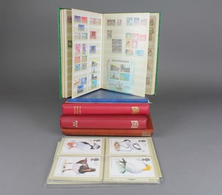 A Stanley Gibbons album of Channel Island stamps, ditto Isle of Man, 2 stock books, 2 albums of Post Office Postcards