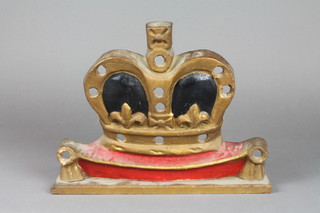 A pressed cardboard Queen's crown raised on a cushion 12" 