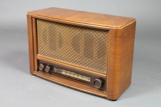 An Ecko model A277 radio contained in a walnut case