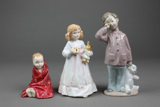 2 Royal Doulton figures - This Little Pig HN1793 4" and Bunnies Bed Time HN3370 7", a Nao figure of a boy with bear 7"  