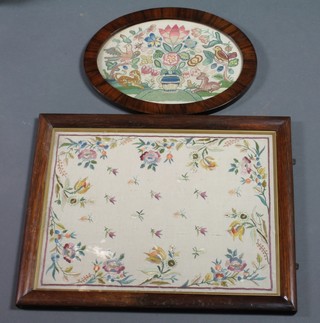A Regency style oval stumpwork panel depicting a vase of flowers and birds, contained in a rosewood frame 11" x 14" together with a rectangular stitchwork picture decorated flowers contained in a rosewood frame 20" x 15 1/2"