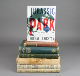 Michael Crichton "Jurassic Park" signed by Michael Crichton, Charles Kingsley, 1 volume "The Water Babies", Rudyard Kipling "A Song for the English" with illustrations by W Heath Robinson, Maurice Meade Maeterlinck "Life of The Bee", 1 volume "World of Wit and Humour" and 3 other books 

