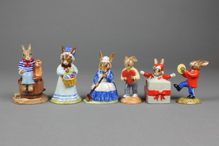 6 Royal Doulton Bunnykins figures - Cymbals from the Umpa Band DB25 4", Christmas Surprise DB146 3", Mrs Bunnykins Clean Sweep DB6 4", Sweetheart DB130 4", Mrs Bunnykins at the Easter Parade DB19 4" and 