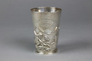 A Victorian silver presentation beaker with detachable repousse collar of a jousting scene, Birmingham 1874, maker Harry Brasted, approx. 11 ozs 