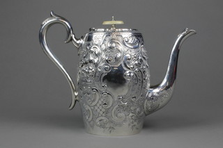 A Victorian silver baluster coffee pot, the repousse floral and scroll decoration with vacant cartouche and S scroll handle, Sheffield 1900, maker J H Potter, approx 33 ozs 