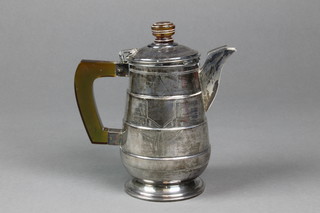 A white metal baluster teapot with Bakelite mounts 6" 